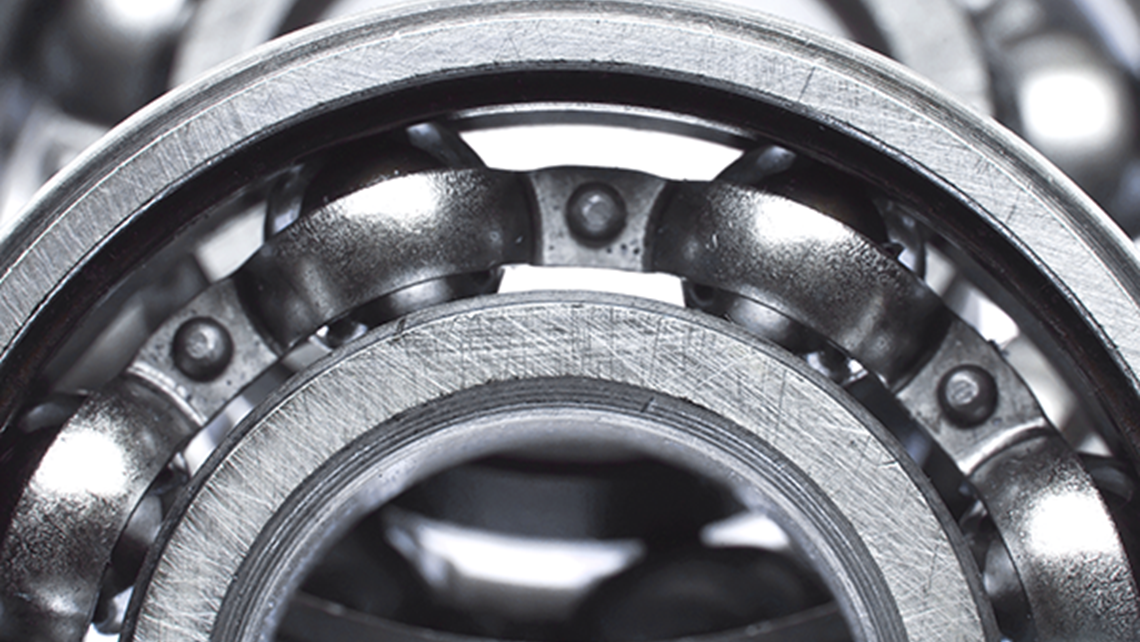 Close-up of ball bearings in dark steel gray